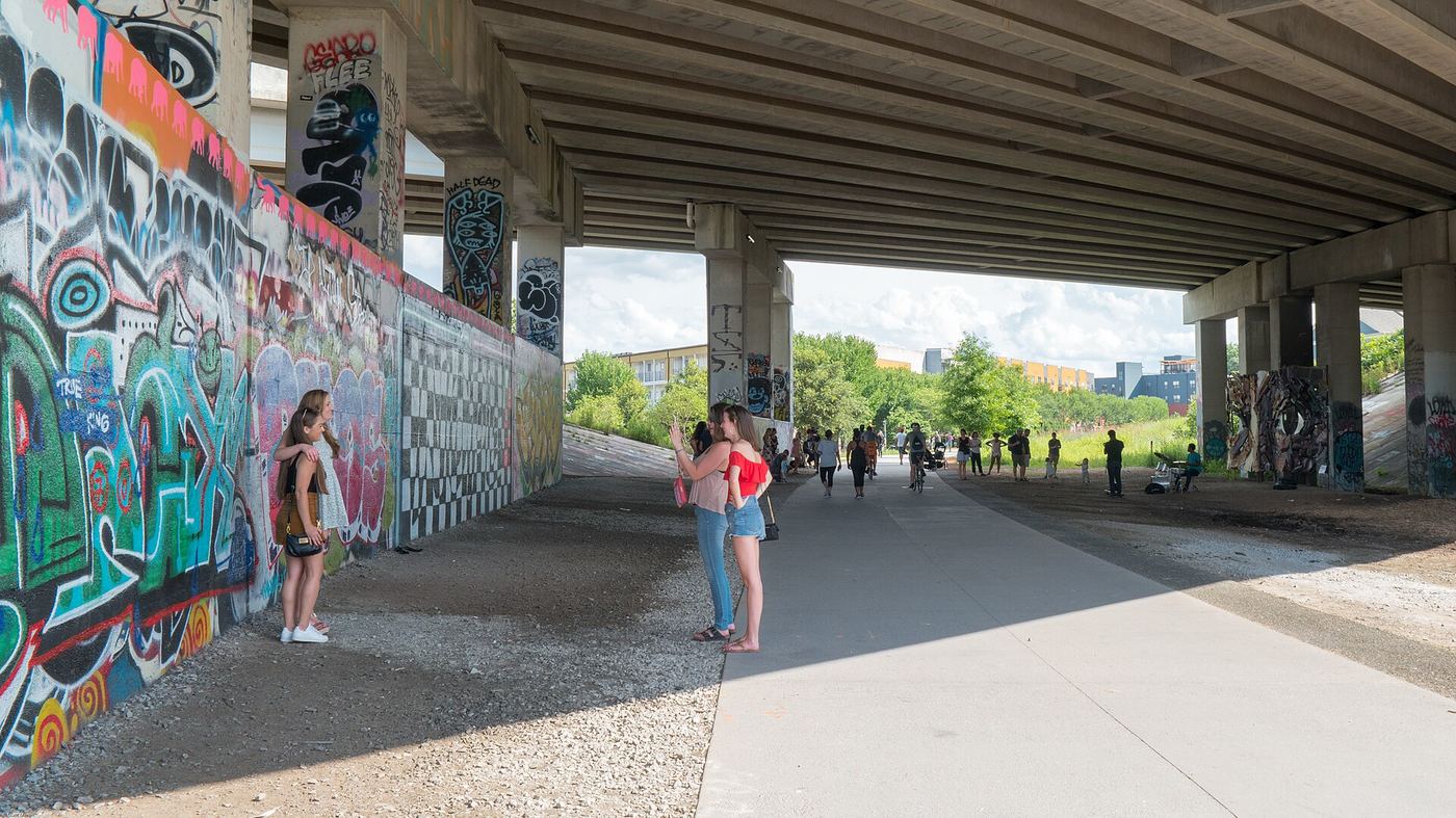 Gathering space along the BeltLine Eastside Trail beneath Freedom Parkway
